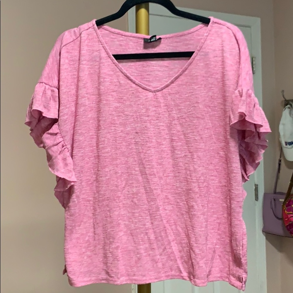 pink v-neck top with ruffle sleeves